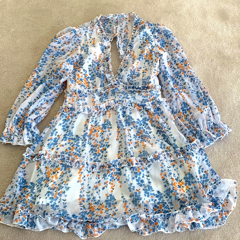 Flirty feminine and floral dress great for summer and spring!